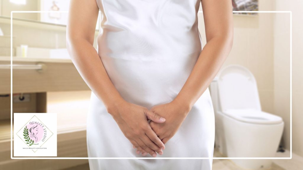 Woman experiencing bladder leak symptoms related to pelvic floor weakness