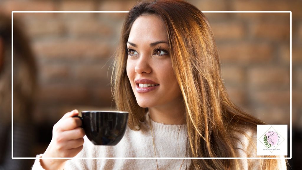 Woman sitting comfortably in a chair in a calm setting, representing a fully clothed and relaxed pelvic floor treatment experience in Derby.