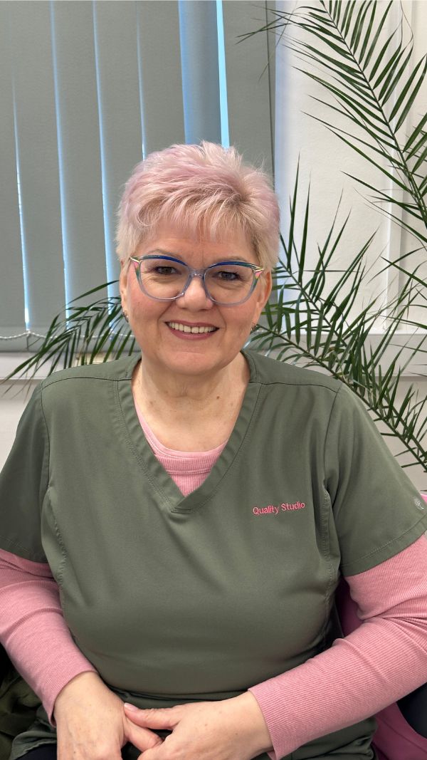 Suzana Fecsik, Founder of Quality Studio & Academy in Derby, helping women and men with pelvic floor chair therapy.